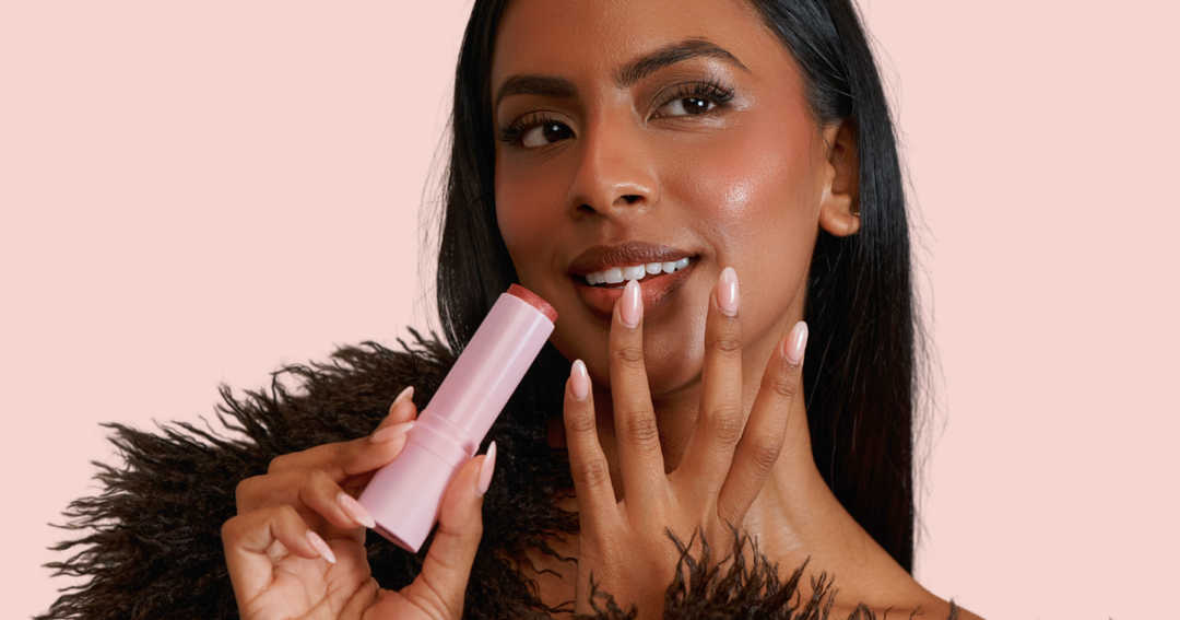 Woman using Lust Minerals Blush Stick