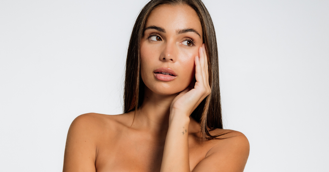 woman with brown hair wearing Lust Minerals makeup 