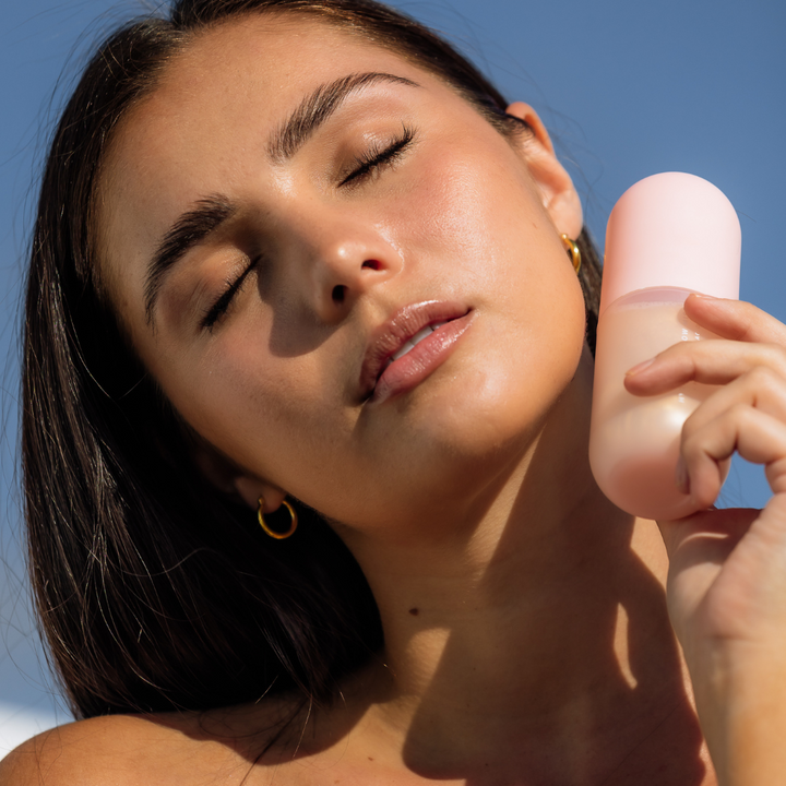 Model with Hydration Glow Mist