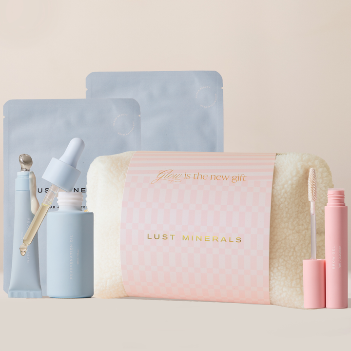 Lust Minerals skincare products including a pouch, bottles, and packets on a light background